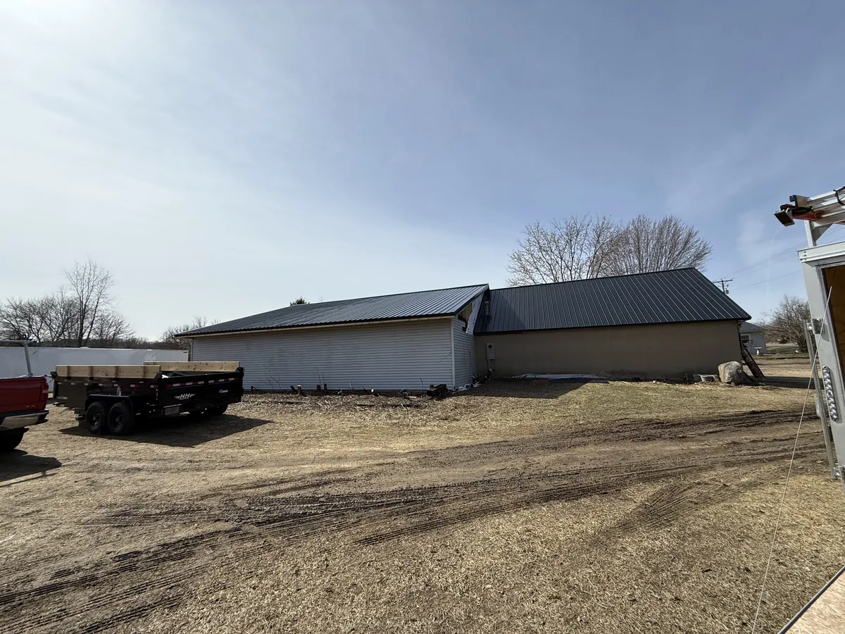 New metal roof on a detached farm outbuilding