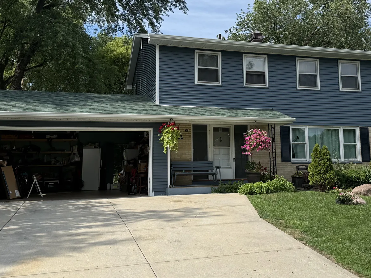 Completed roof and siding on a two story home