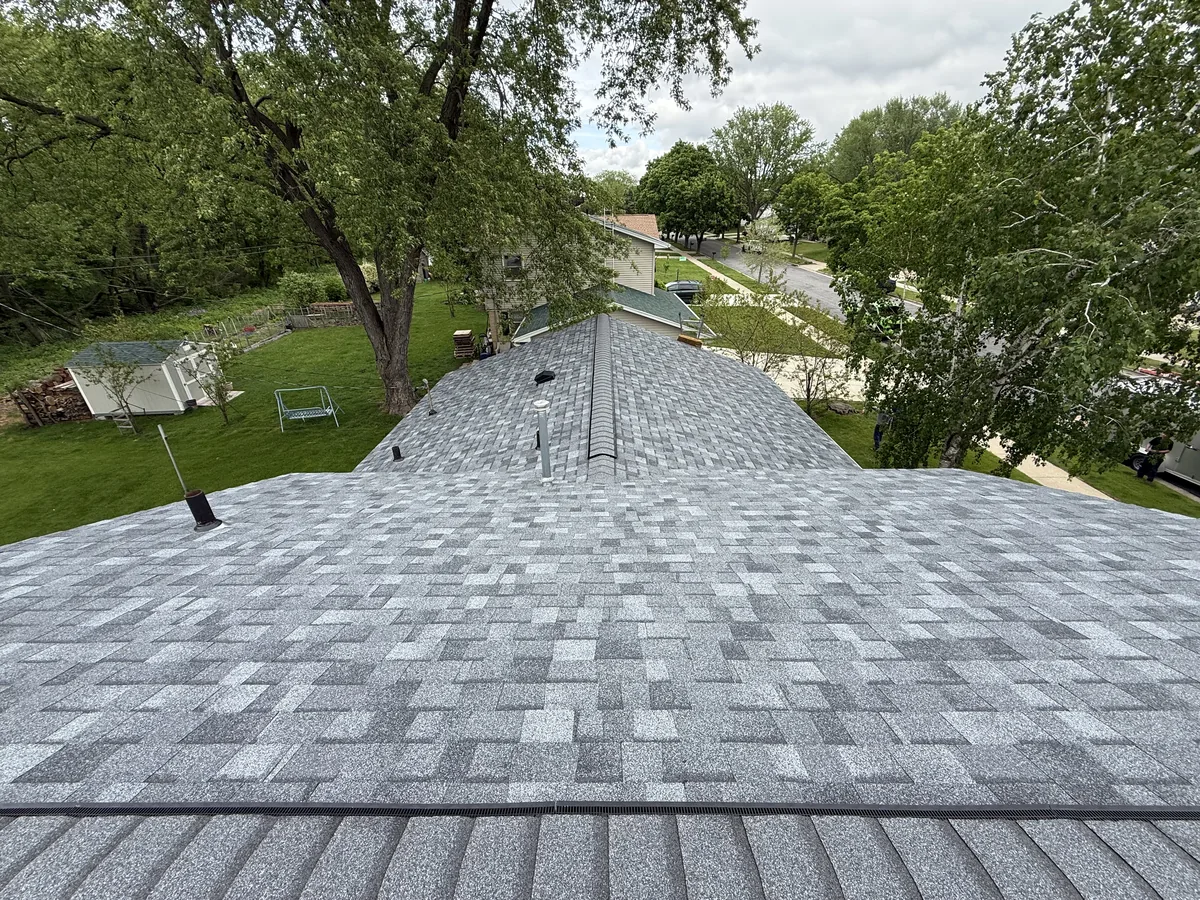Gray shingle roof across a long roof plane