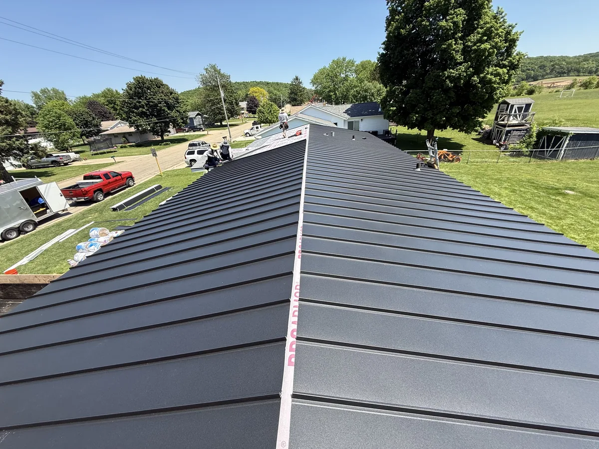 Dark gray standing seam metal roof panels